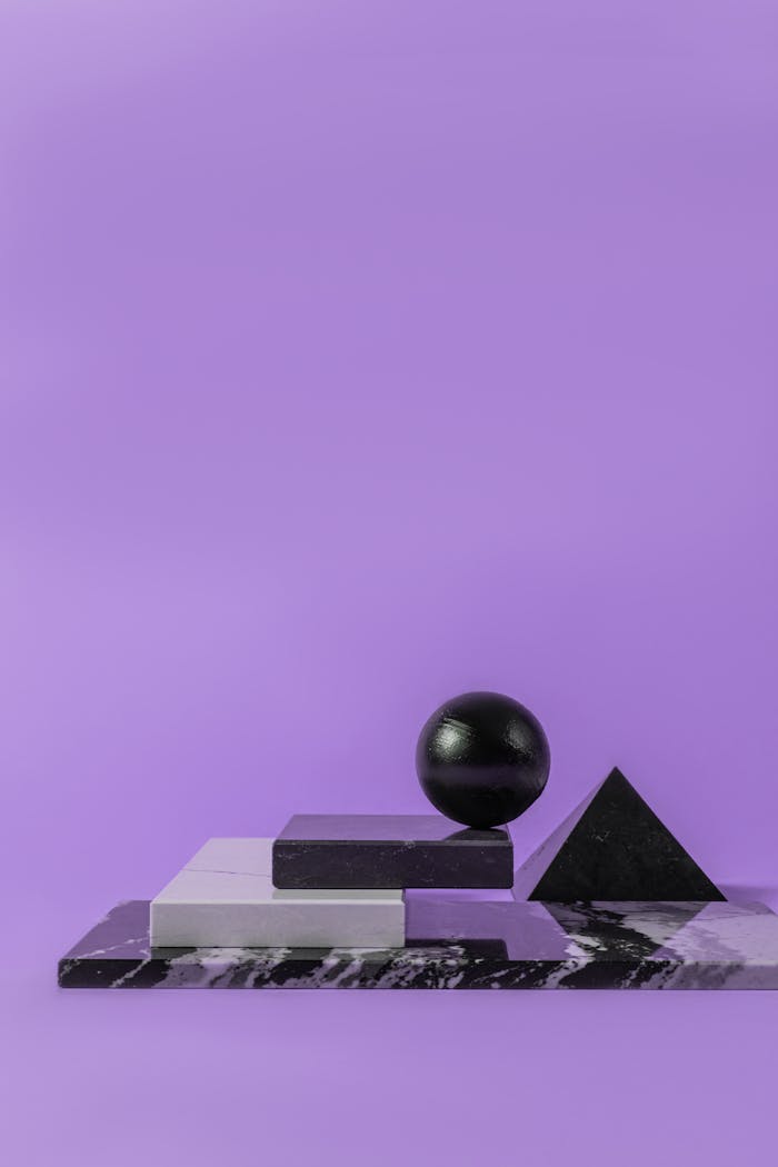 Black Sphere Object on Top of Black Object